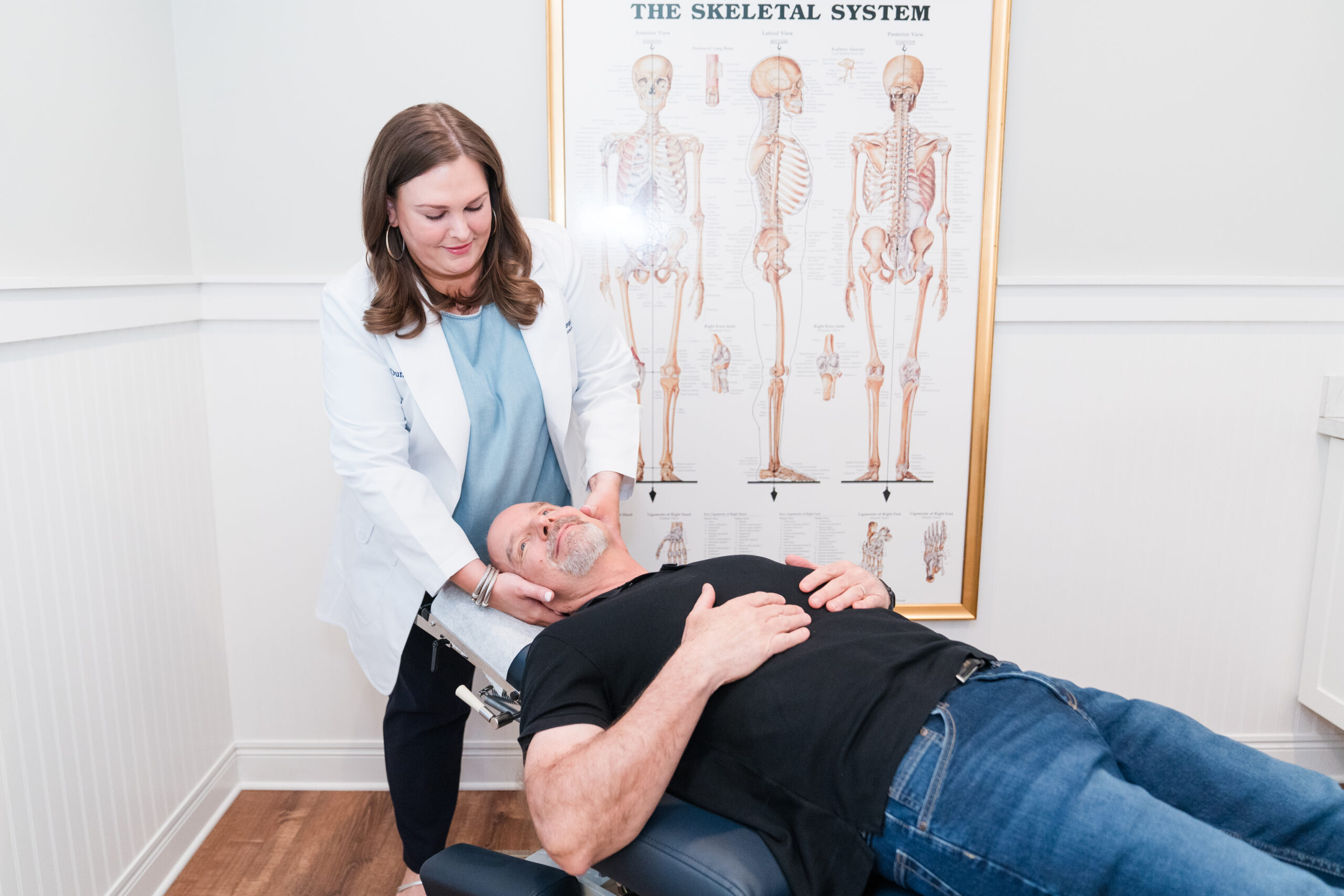 chiropractor performing adjustment