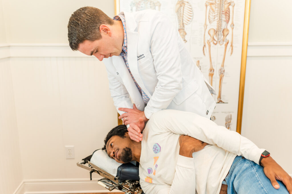 Dr. Modlin performing an adjustment