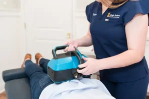 Photo of one of our uniformed interns assisting a client.